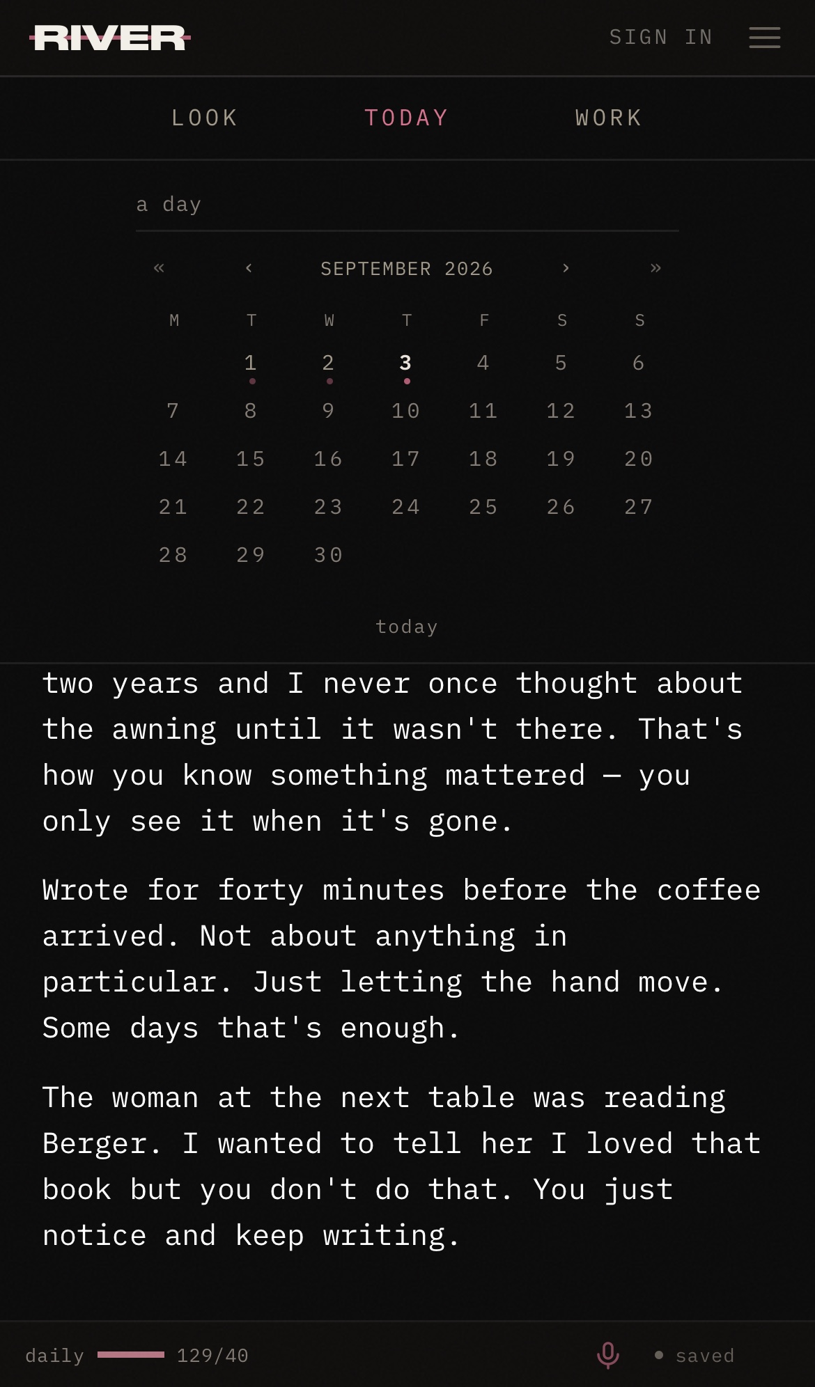 September’s calendar open above the writing. Dots mark days with writing.